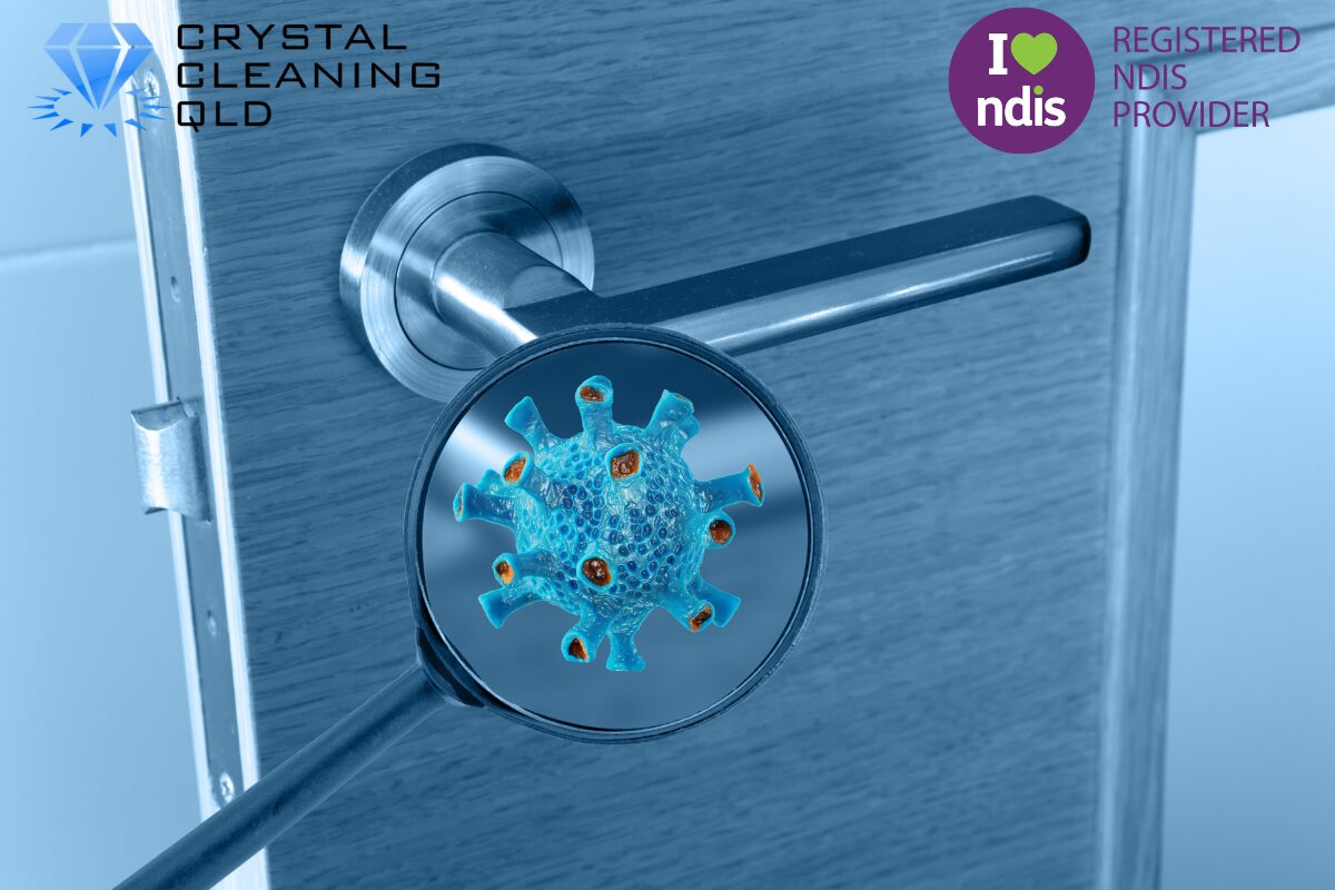 A close-up of a metal door handle with a blue tint, viewed through a magnifying glass that reveals a detailed 3D illustration of a virus cell, as shown in 名称未設定 (1200 x 800 px) (14).jpg. The Crystal Cleaning QLD and Registered NDIS Provider logos are placed in the upper corners to accompany the infection control guide on how to perfect cleaning & support easily.