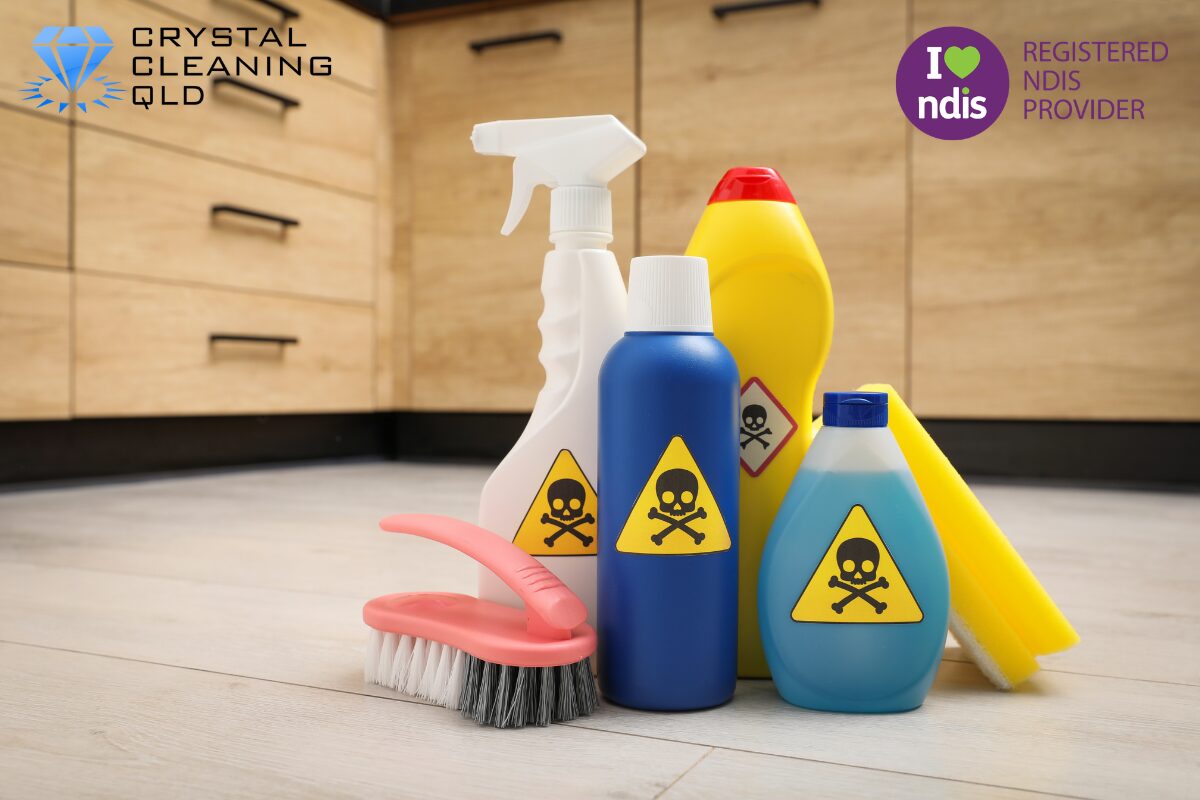 A professional blue spray bottle fitted with a clear, printed label detailing the product name, precise dilution instructions, and safety information, placed on a pristine kitchen benchtop.