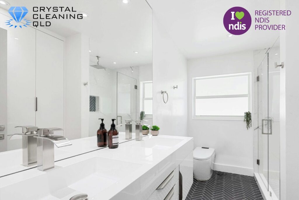 A sparkling, spotless bathroom with a close-up on modern, shiny chrome tapware and fixtures completely free of water spots.